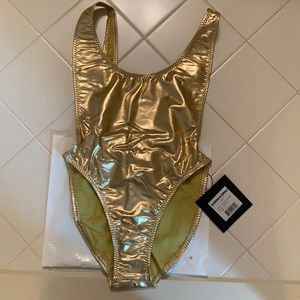Norma Kamali. Gold one piece. Size SMALL